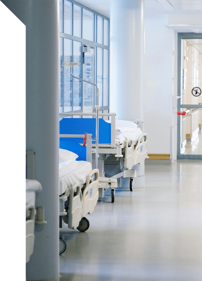 medical beds in hospital hallway